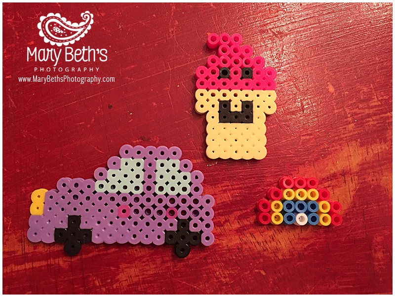 Augusta GA Newborn Photographer images of her daughter making creations with perler beads | Mary Beth's Photography