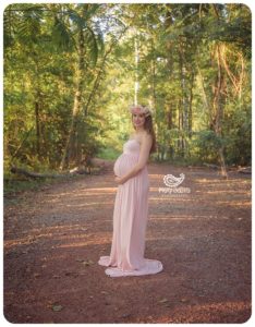 Augusta GA photographer images of outdoor maternity session with mother dressed in pink dress with a flower crown | Mary Beth's Photography