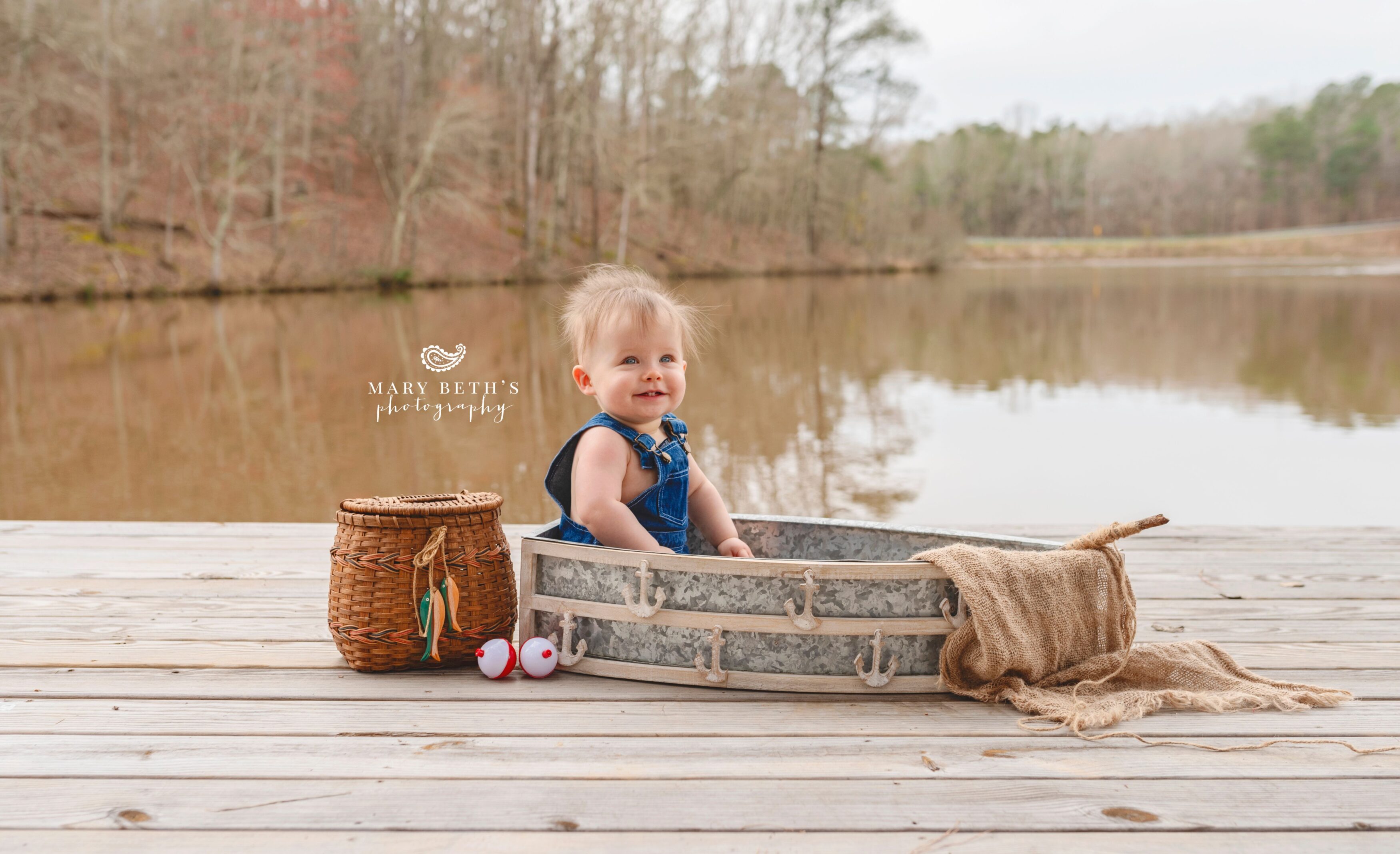 baby boy outdoor by the water portrait