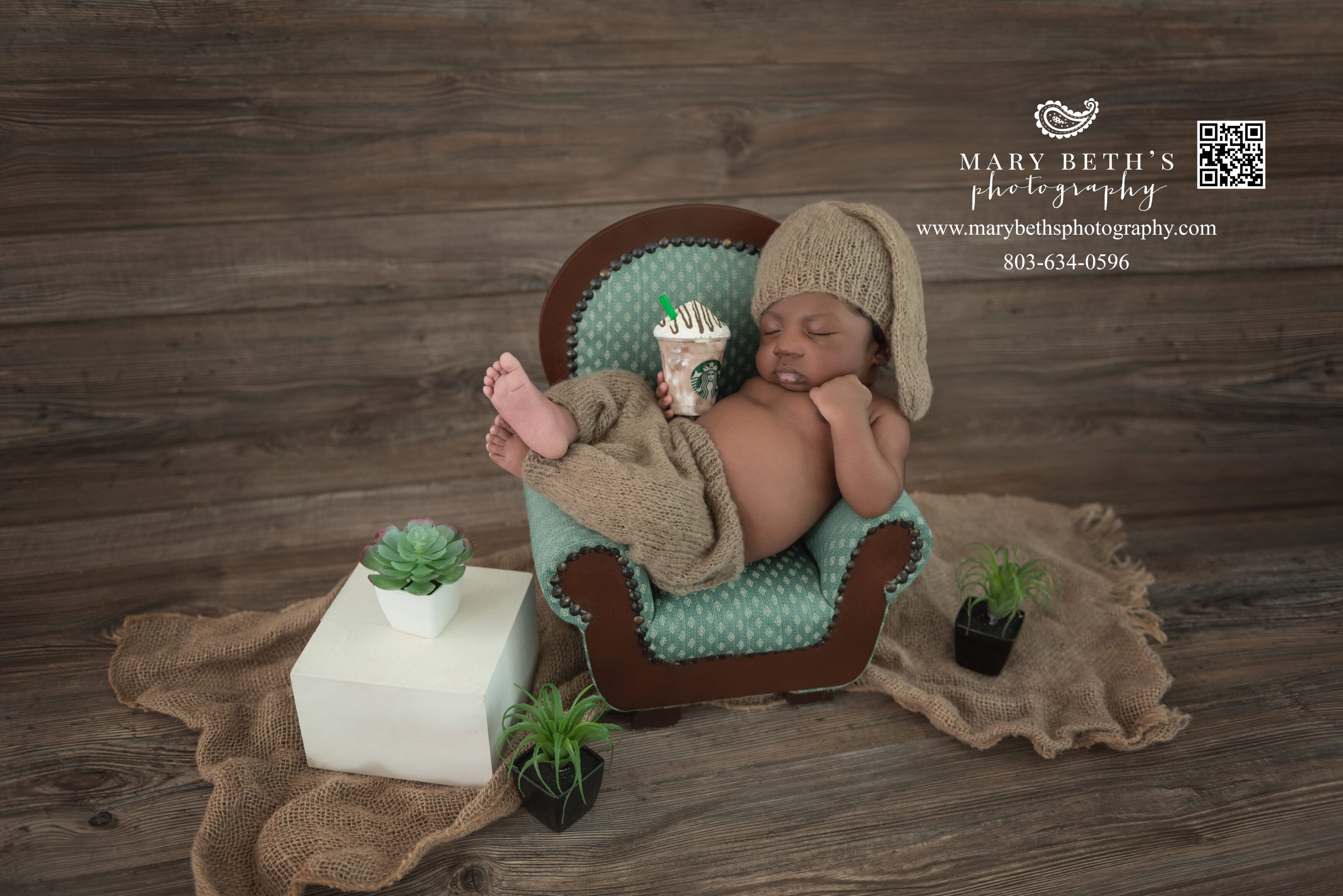 Newborn baby boy in custom Starbucks set design in Augusta, Ga